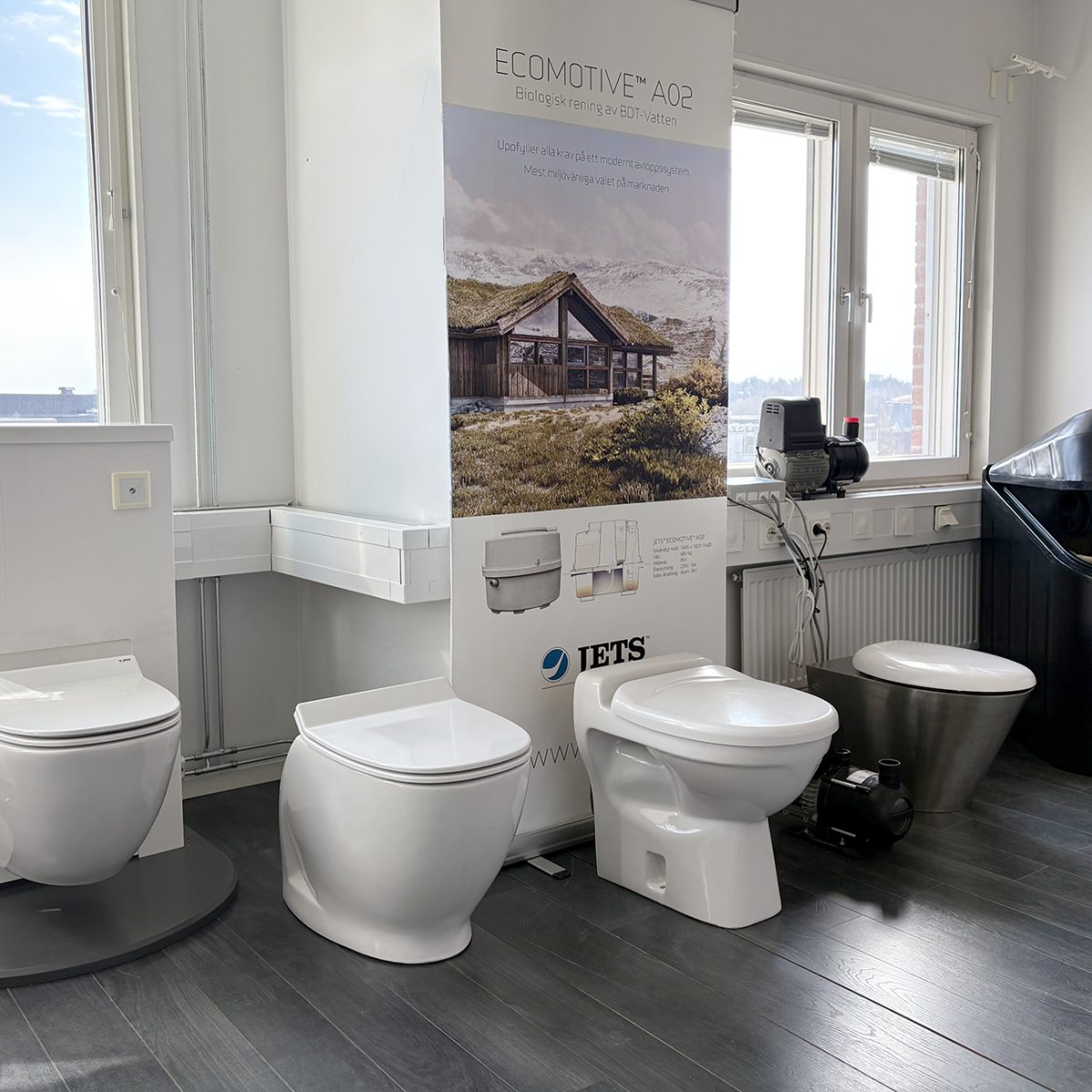 A selection of JETS vacuum toilets displayed in the new showroom in Stockholm. The showroom is designed for product demonstrations, training sessions and customer visits.