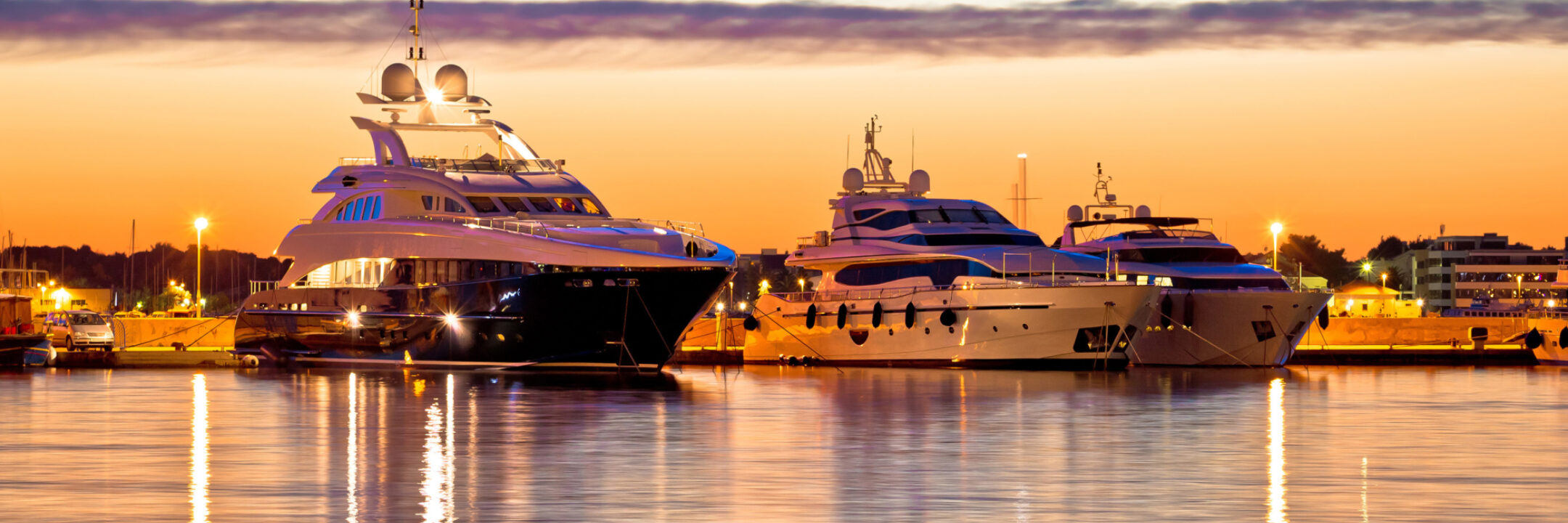 Yachts in a harbour at night